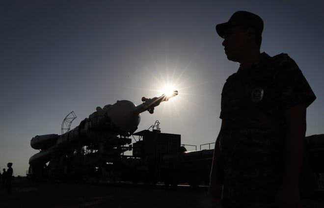 The Soyuz booster rocket with Soyuz MS-13 spacecraft is being rolled out to the launch pad by train at the Russian leased Baikonur cosmodrome, Kazakhstan, July 18, 2019. The launch of the mission is scheduled on July 20, from the Baikonur Cosmodrome in Kazakhstan.