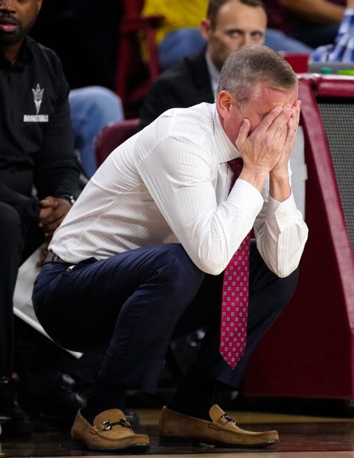 ASU head coach Bobby Hurley reacts after a foul call during a game against Washington at Desert Financial Arena.