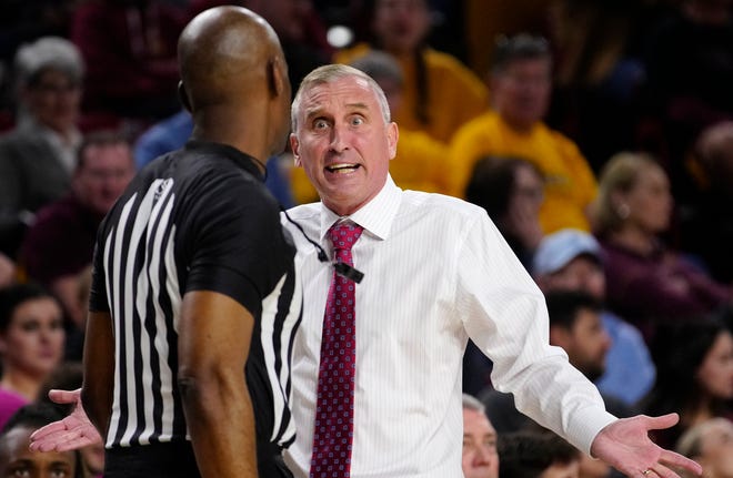 ASU head coach Bobby Hurley argues with an official during a game against Washington at Desert Financial Arena.