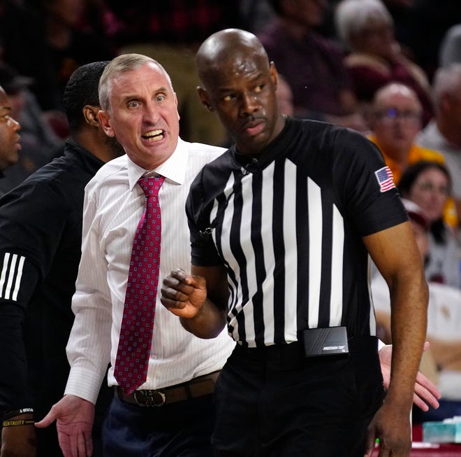 ASU head coach Bobby Hurley argues with an official during a game against Washington at Desert Financial Arena.