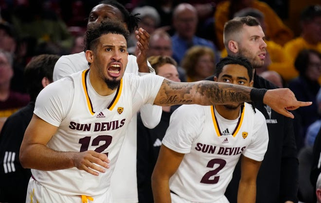 ASU guard Jose Perez (12) yells to his teammate during a game against Washington at Desert Financial Arena.