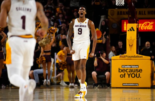 ASU center Shawn Phillips Jr. (9) screams to his teammates as they tie the game against Washington during a game at Desert Financial Arena.