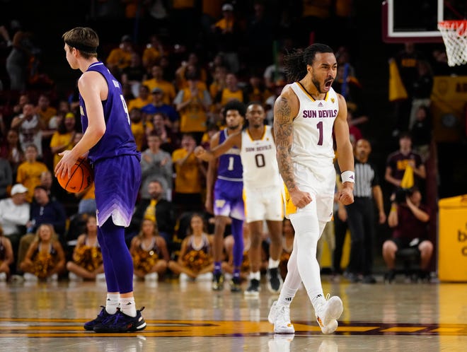 ASU guard Frankie Collins (1) reacts after making a late basket against Washington during a game at Desert Financial Arena.