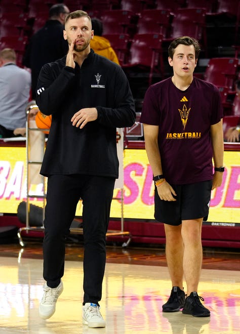 Former ASU forward Mickey Mitchell calls out to players prior to a game at Desert Financial Arena.