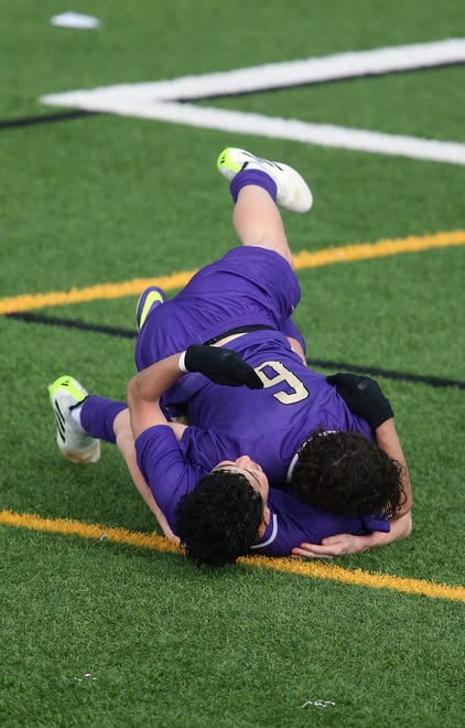 North Kitsap’s Harper Sabari (6) and Pepe DeLuna (10) celebrate Sabari’s goal that put them 2-1 ahead of Skyline on Saturday, March 9, 2024.