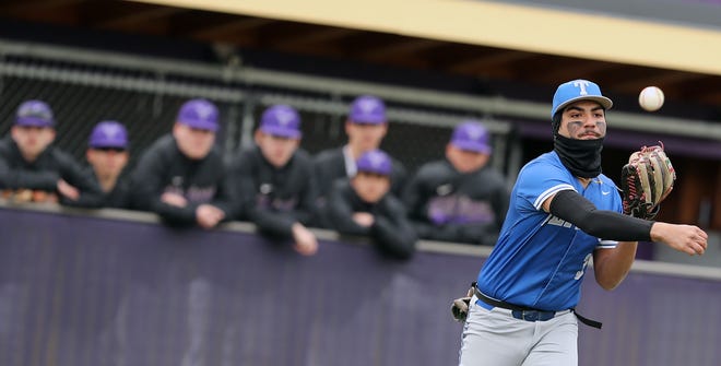 Olympic’s Antonio Castorena makes a throw to first during they game against North Kitsap in Poulsbo on Wednesday, March 20, 2024.