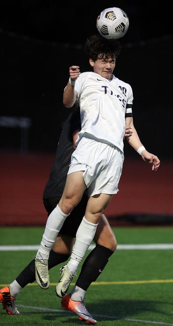 Gig Harbor’s Tyler Dull (10) heads the ball against Central Kitsap in Silverdale on Thursday, March 21, 2024.