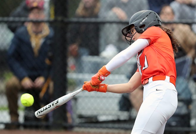 Central Kitsap’s Ava Day connects with a pitch against Kingston in Silverdale on Friday, March 22, 2024. Kingston won the game 13-8.