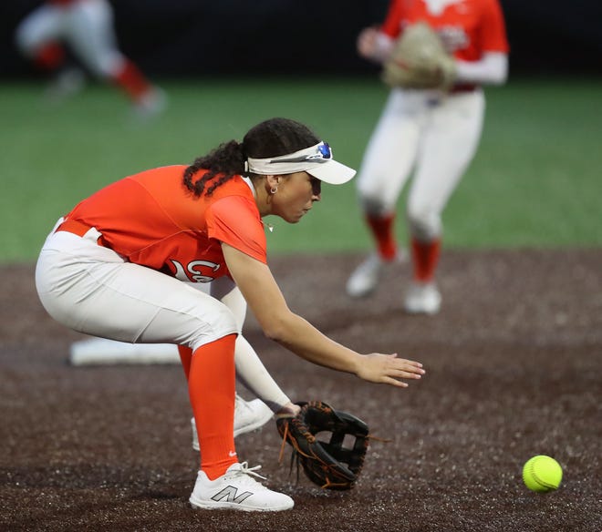 Central Kitsap’s Ava Day fields a Kingston grounder in Silverdale on Friday, March 22, 2024. Kingston won the game 13-8.