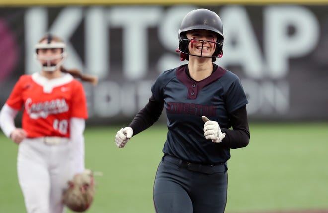 Kingston’s Navaeh Sullivan grins as she rounds second after her home run hit against Central Kitsap in Silverdale on Friday, March 22, 2024.