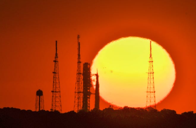 The sun rises over Pad 39B at Kennedy Space Center, FL, Sunday, March 27, 2022, where NASA’s SLS rocket sits awaiting testing ahead of a potential launch to the moon.