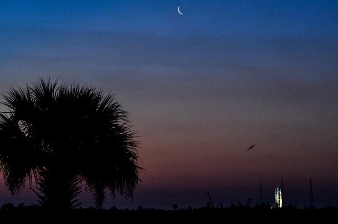 The sun rises over Pad 39B at Kennedy Space Center, FL, Tuesday, March 29, 2022, where NASA’s SLS rocket sits further testing ahead of a potential launch to the moon.