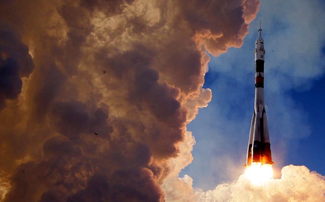 The Russian Soyuz booster rocket FG with Soyuz MS-07 spacecraft lifts off from the launch pad at Baikonur Cosmodrome in Kazakhstan, Dec. 17,  2017.